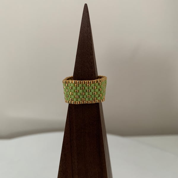 Vibrant green and gold beaded ring