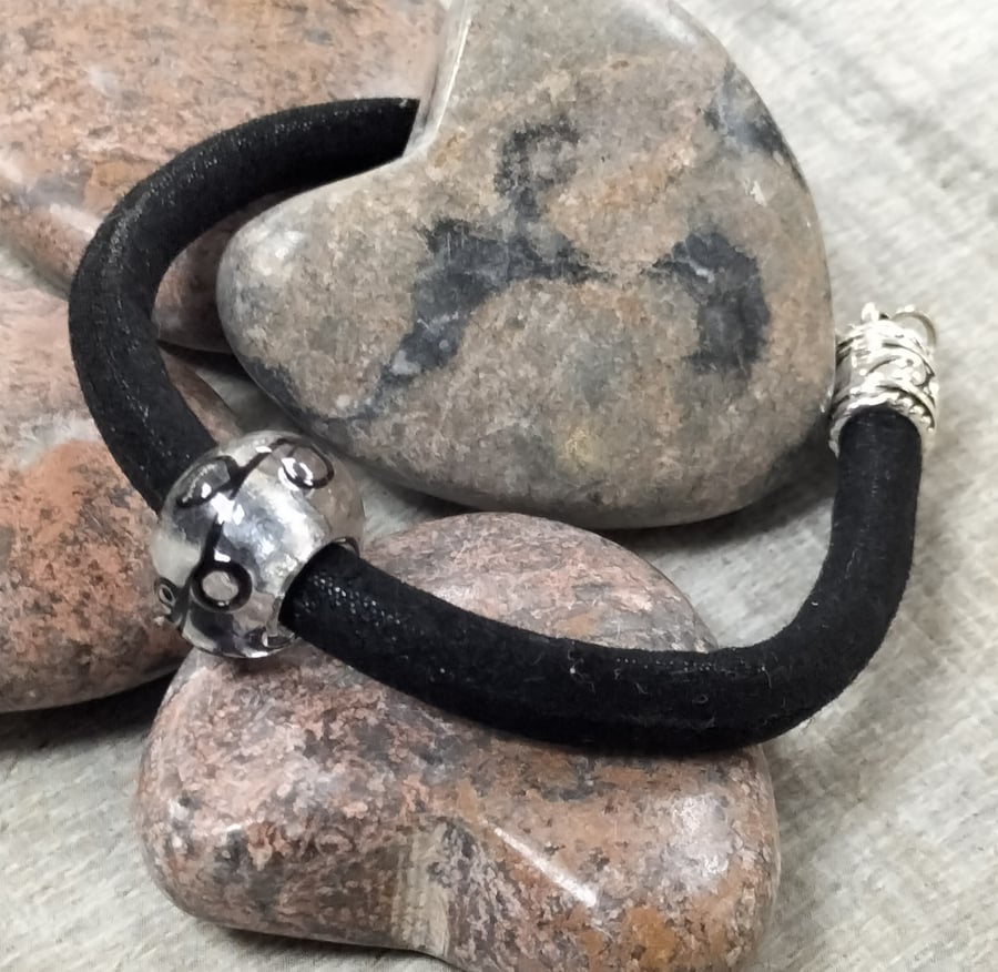 Black fabric bracelet with glass bead