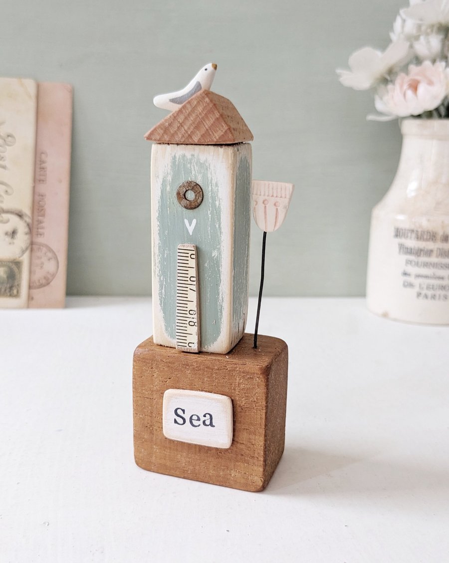 Tall Wooden Sea Hut with Clay Flower and Seagull 'Sea'