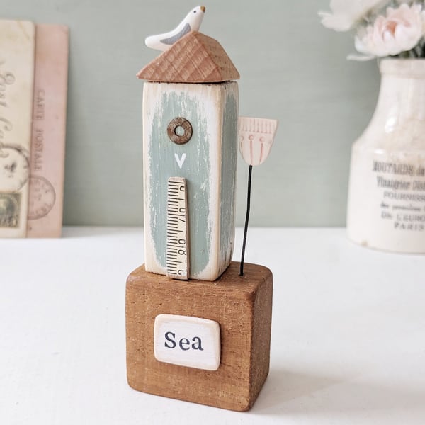 Tall Wooden Sea Hut with Clay Flower and Seagull 'Sea'
