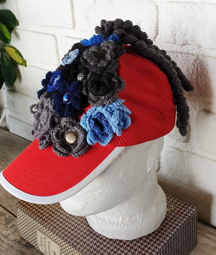 Red baseball Cap with Gray Blue Black Crochet Flowers and crochet tail