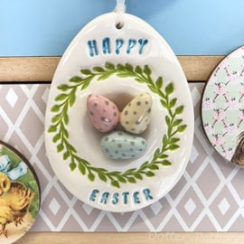 Pottery Easter Egg decoration with eggs in a nest