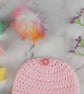 Pink Crochet Baby Hat Newborn to 3 Months with Bobble Flower and Rainbow Pom - Image 7