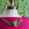 Circle and flower recycled collar