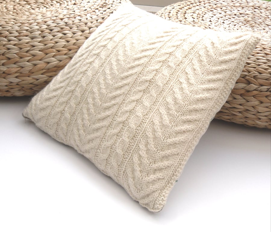 Hand knit Wool cushion cover . One side knitted , the other pretty linen