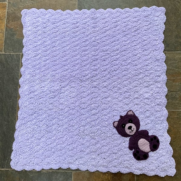 Crocheted chenille baby blanket, super soft and cuddly.