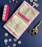 Patchwork stripe needle case made from Tilda fabric in shades of red and pink - Image 4