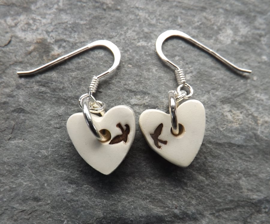 Handmade ceramic and sterling silver heart shaped swallows drop earrings