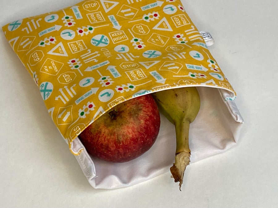Reusable sandwich bag with food safe lining. Yellow road signs