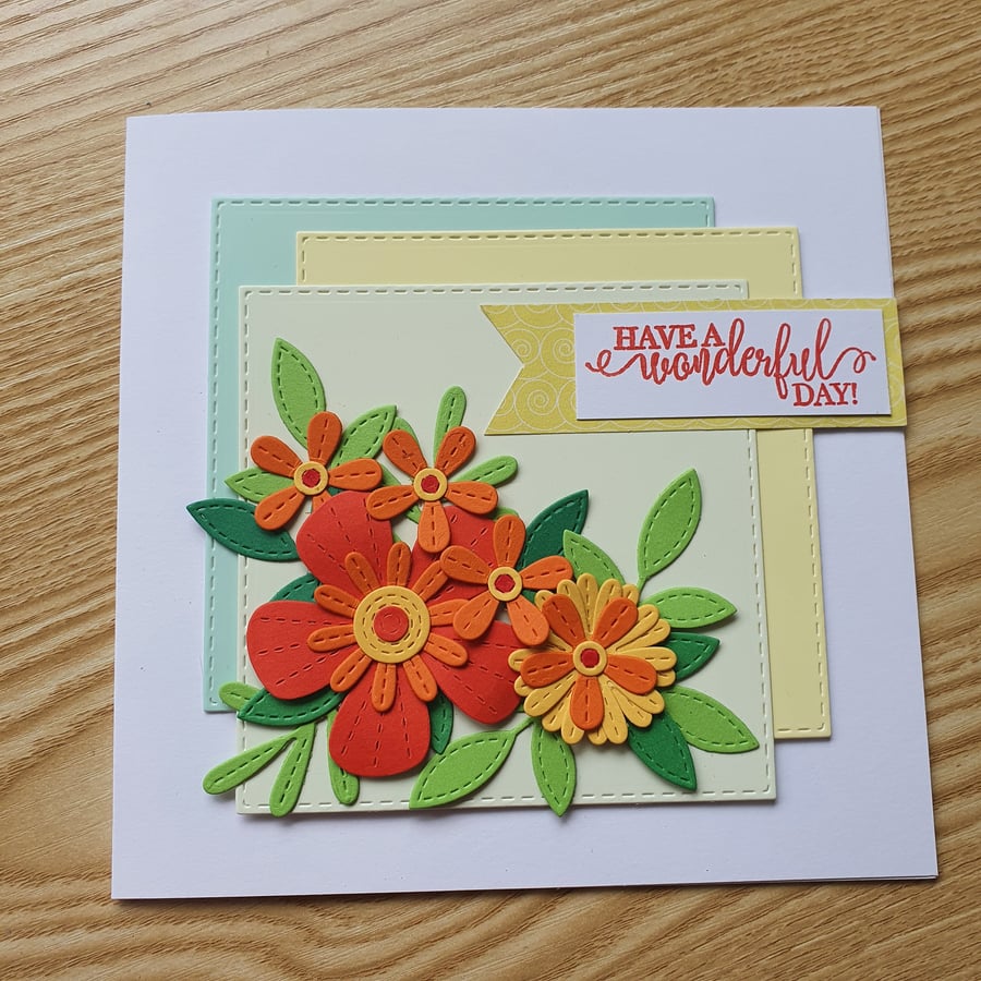 A floral die cut birthday card for a woman