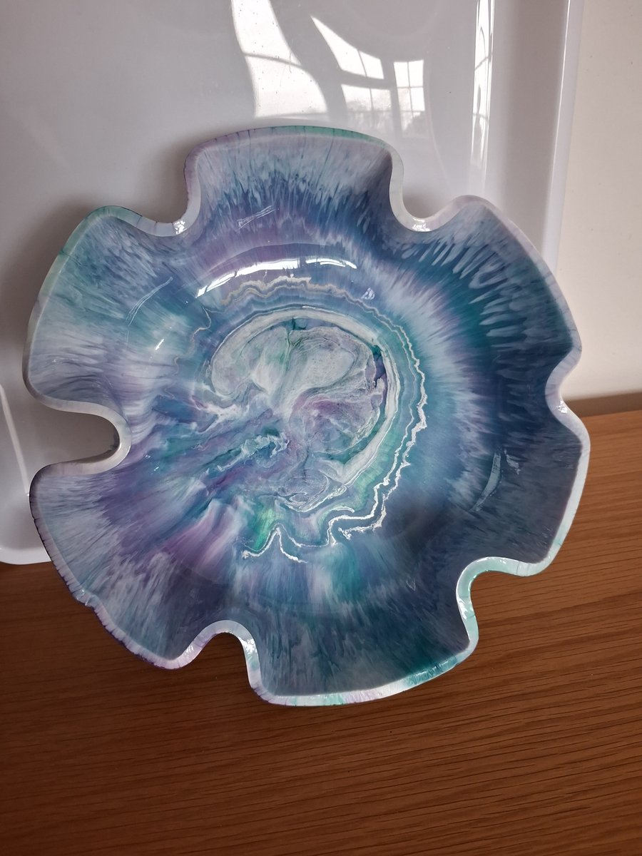 Handmade marbled epoxy resin decorative bowl.