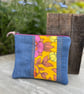 Embroidered Roundelay cotton and denim patchwork pouch one of a kind