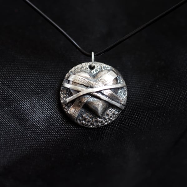 Handmade Fine Silver Heart Pendant from Cornwall with Crossed Bands