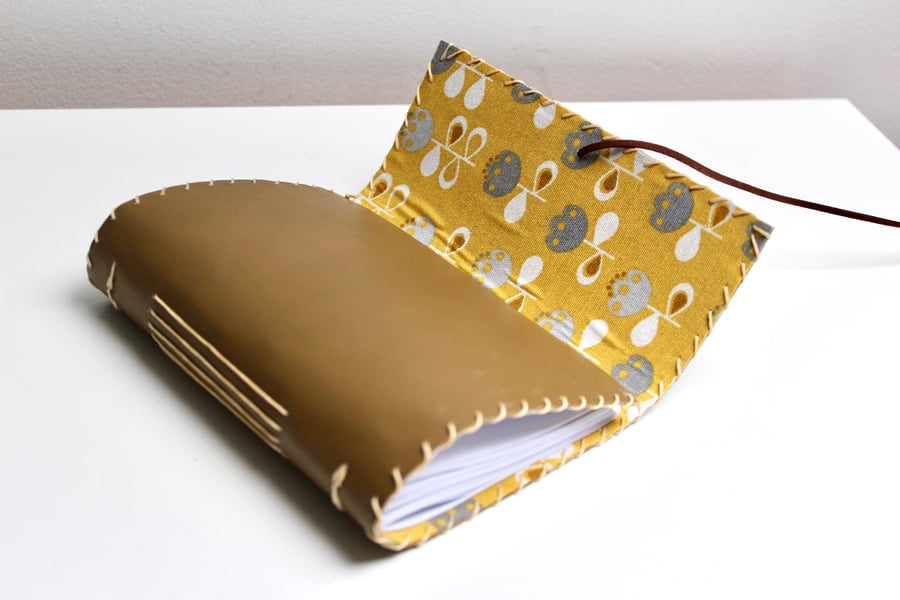 A6 Handmade Brown Leather notebook with floral fabric lining 