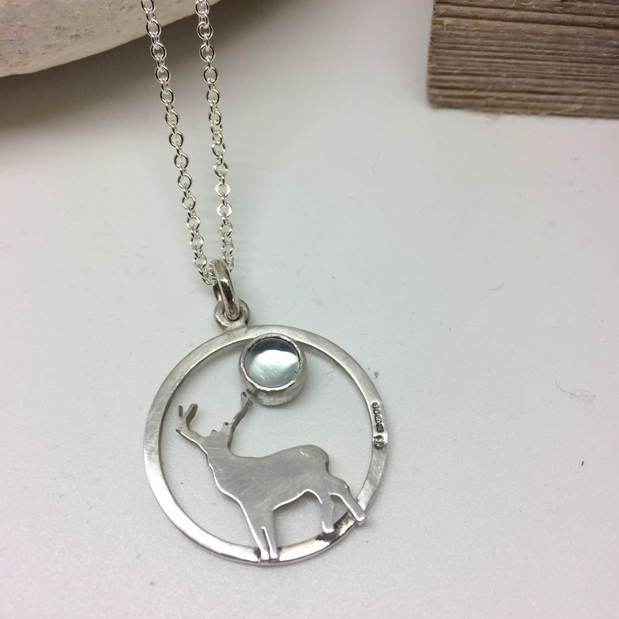Stag pendant with Blue Topaz stones