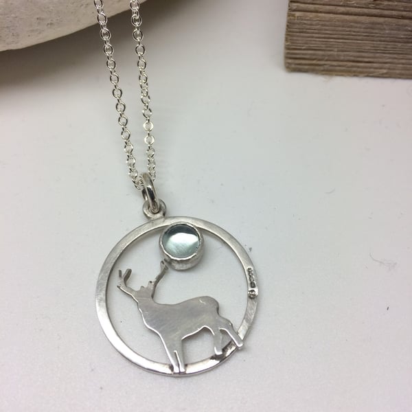 Stag pendant with Blue Topaz stones