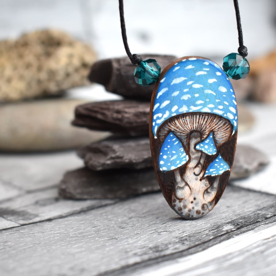 Blue Toadstool pyrography woodland pendant. Wooden oval pendant.