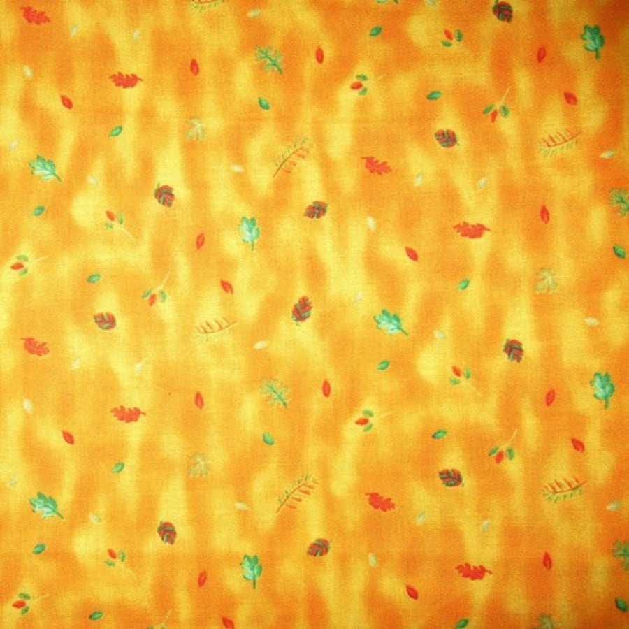 Mixed Leaves on Orange & Yellow background - fat quarter