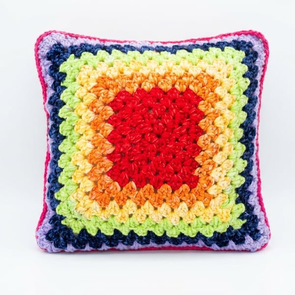 Cosmic Confetti Crochet Cushion – Orange, Yellow, Green & Purple Handmade Pillow