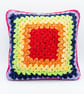Cosmic Confetti Crochet Cushion – Orange, Yellow, Green & Purple Handmade Pillow