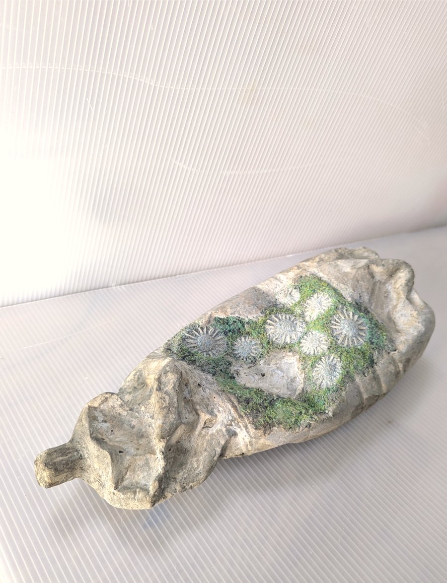 Upstream: Greener Loop XL Bottle sculpture textiles plus concrete
