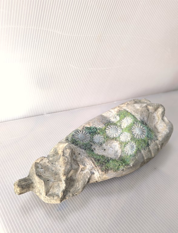 Upstream: Greener Loop XL Bottle sculpture textiles plus concrete