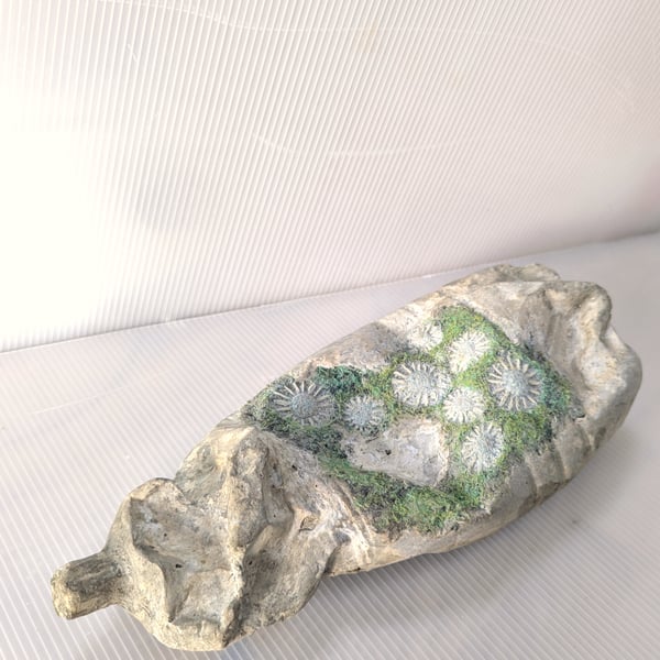 Upstream: Greener Loop XL Bottle sculpture textiles plus concrete