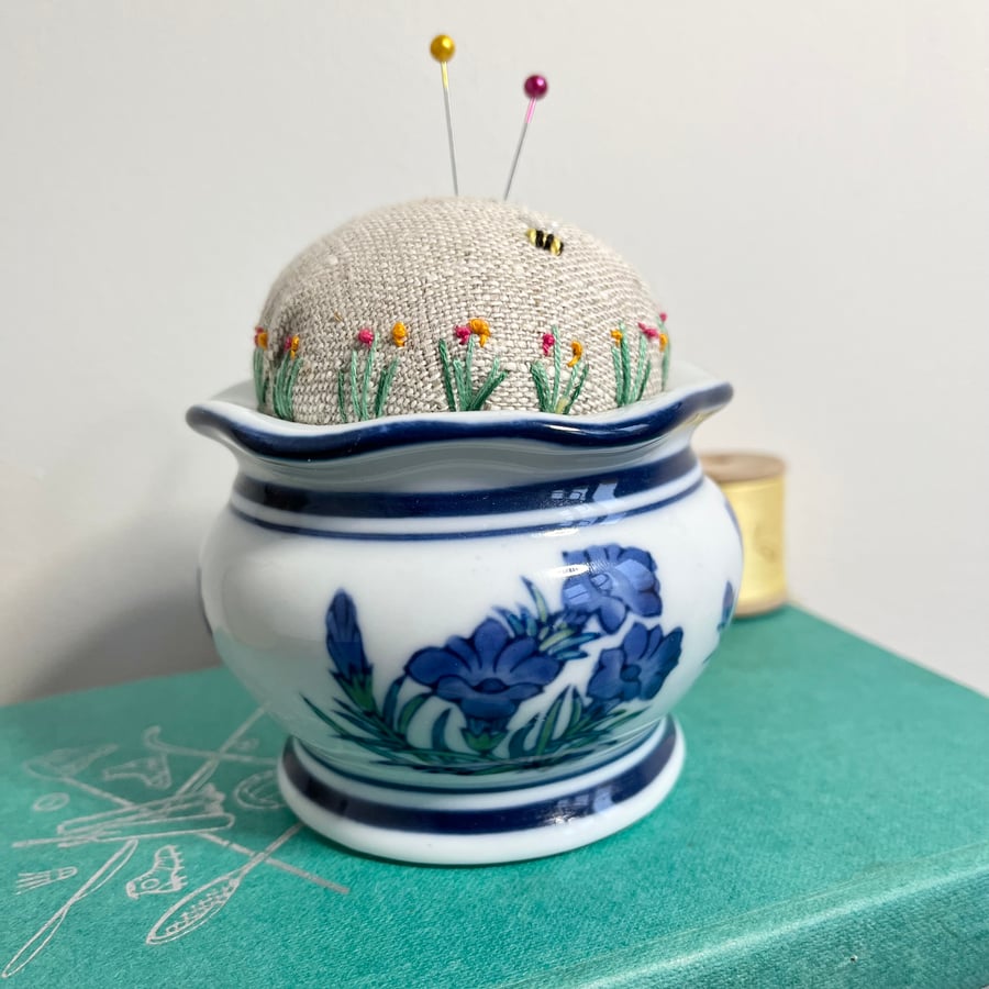 Blue and white vase embroidered pin cushion with bee and flowers