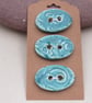 3 Medium Oval Jade Green Brocade Pattern Ceramic Buttons - Image 1