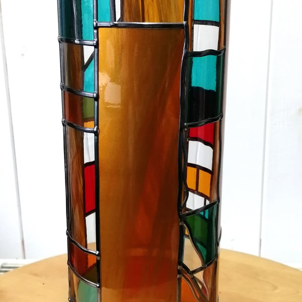 India is a 30cm Stained Glass Effect Flower Vase