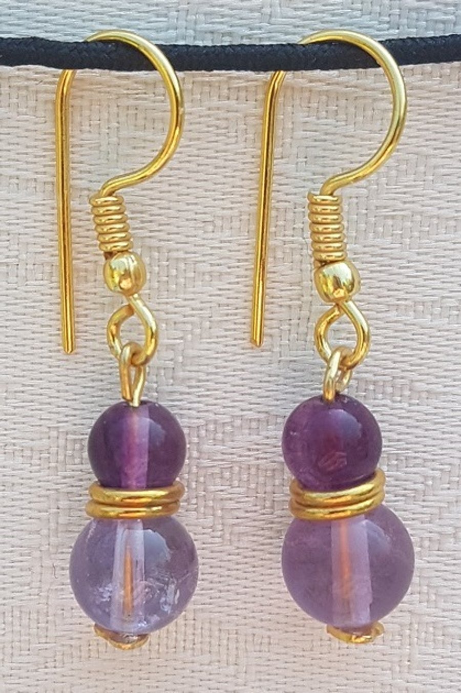 Gorgeous purple beaded earrings
