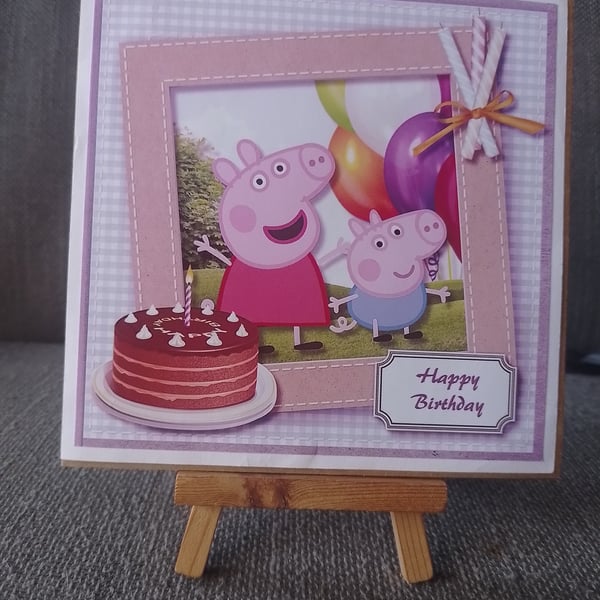 Pepper pig with a cake