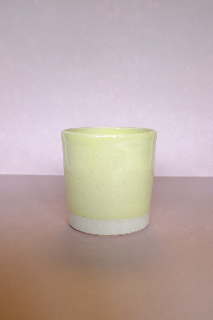 Small yellow plant pot