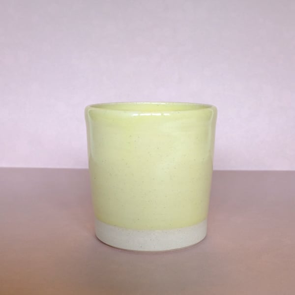 Small yellow plant pot