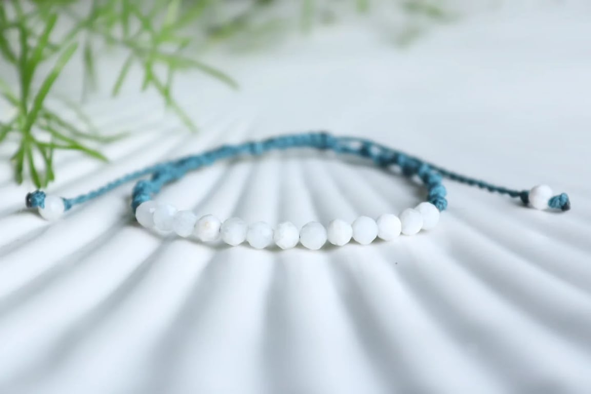 bracelet with Moonstone in turqoise colour cord