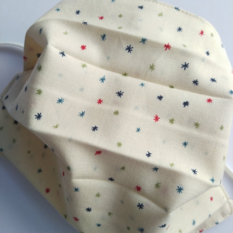 Fabric Face Covering - Christmas: Cream with multi coloured stars