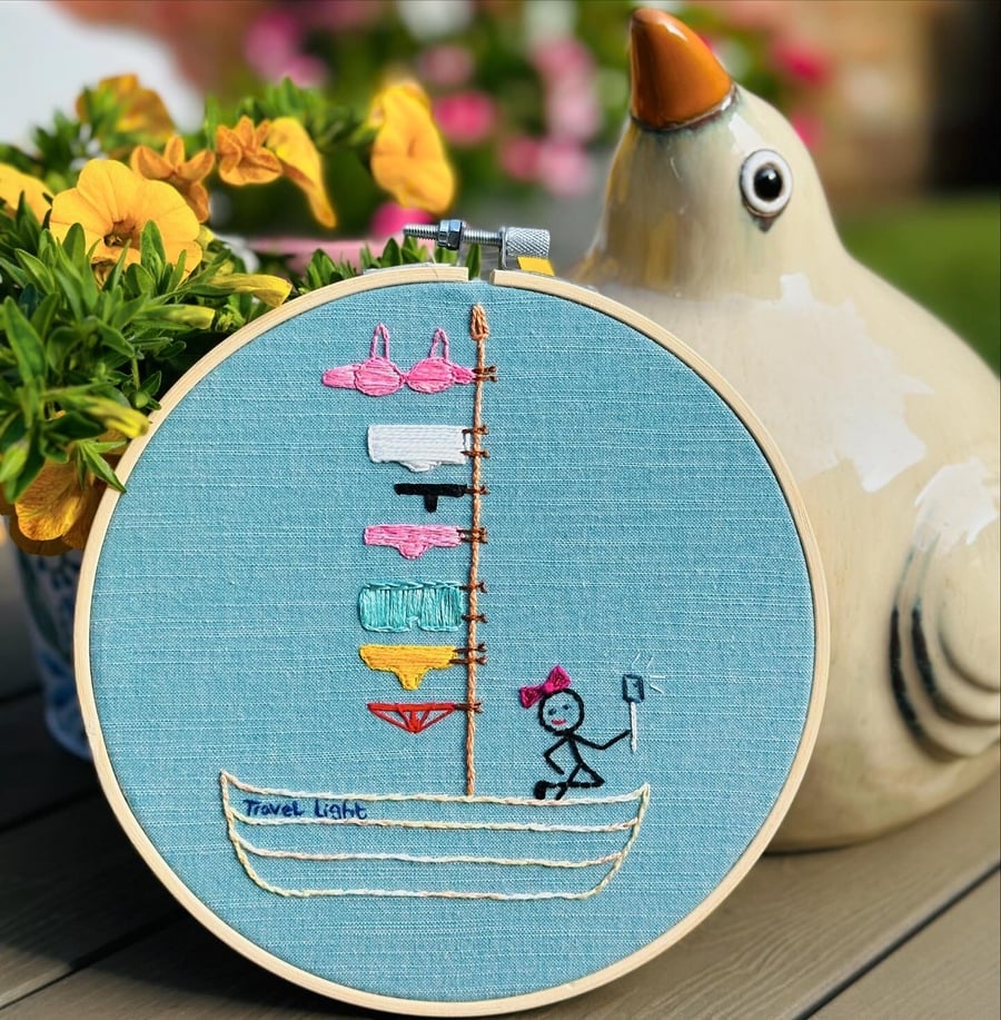 A funny embroidery wall hanging hoop, sailing themed selfie on a boat design fun