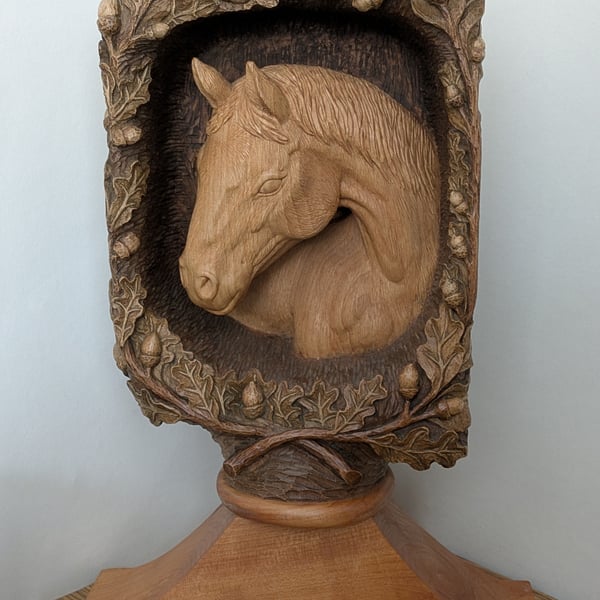 Deep relief horse head wooden sculpture 