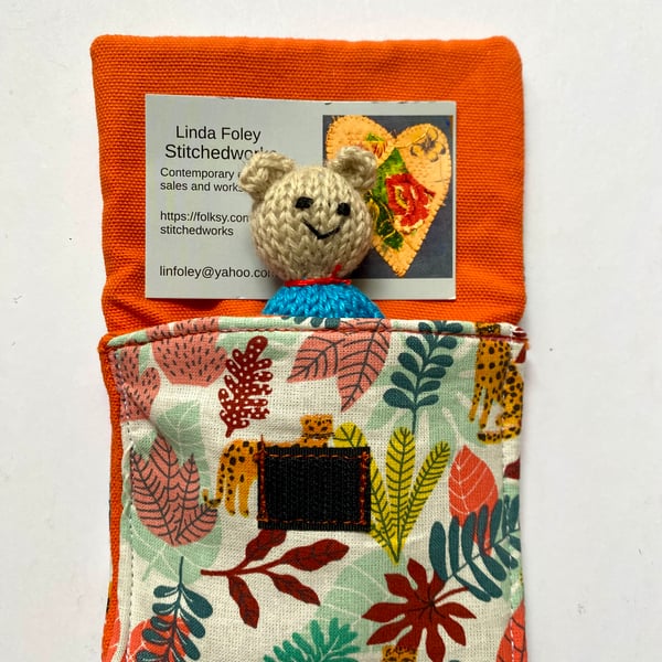 Tiny ted in a bed, hand knitted mini bear in a purse 