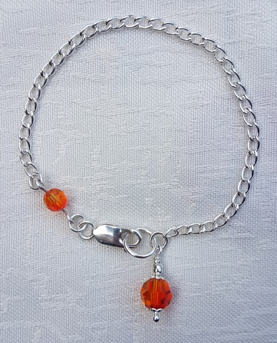 Beautiful Sterling Silver Chain bracelet with Fire Opal Crystals.