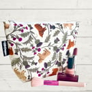 Makeup bags highland cows and thistles