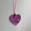 Purples and pinks wooden heart