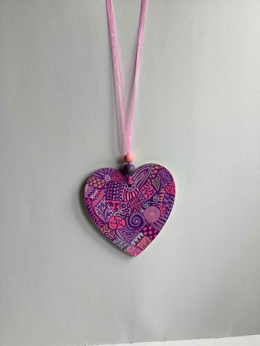 Purples and pinks wooden heart