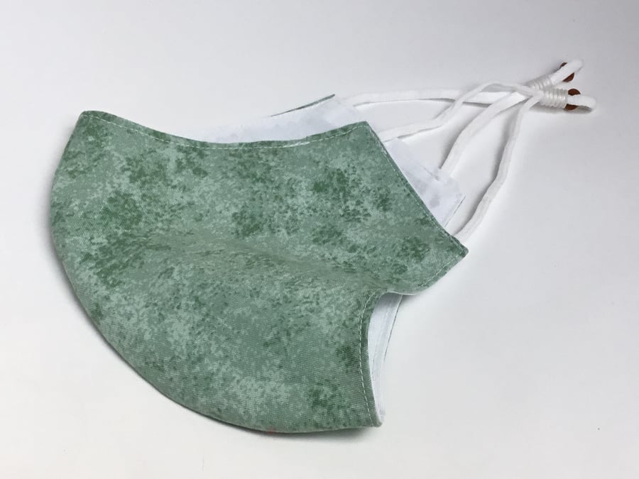 One large size double layered reusable washable and adjustable face mask