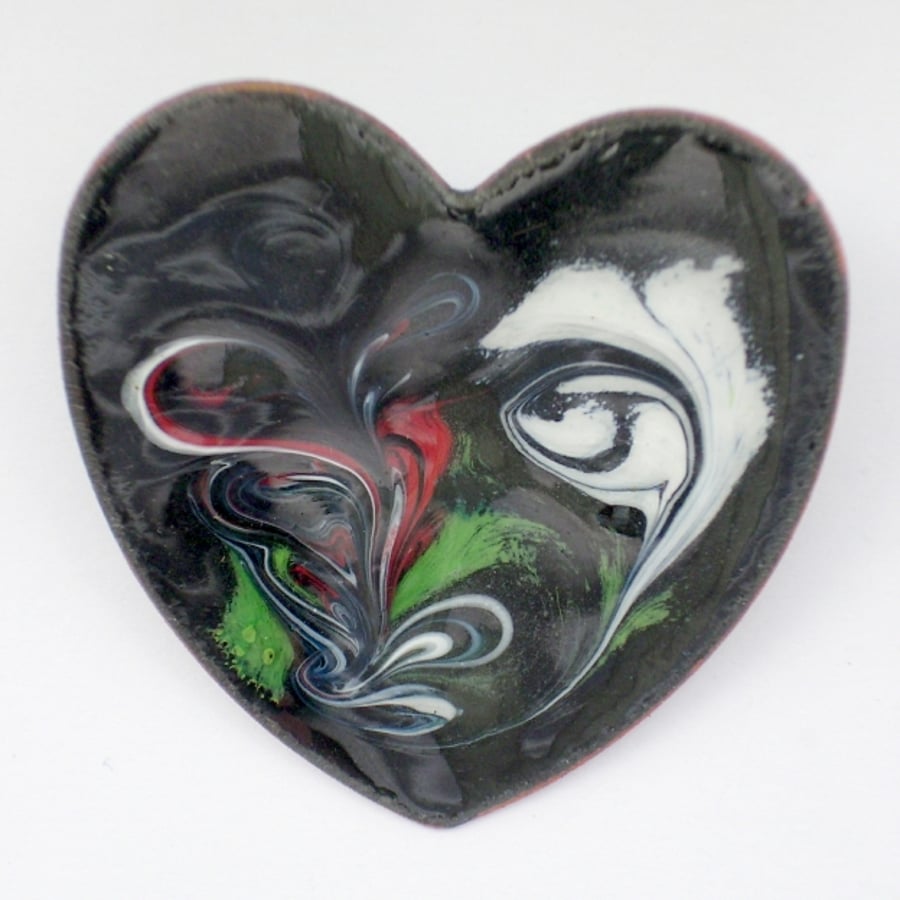 Heart shape brooch - scrolled white, red ,green on black