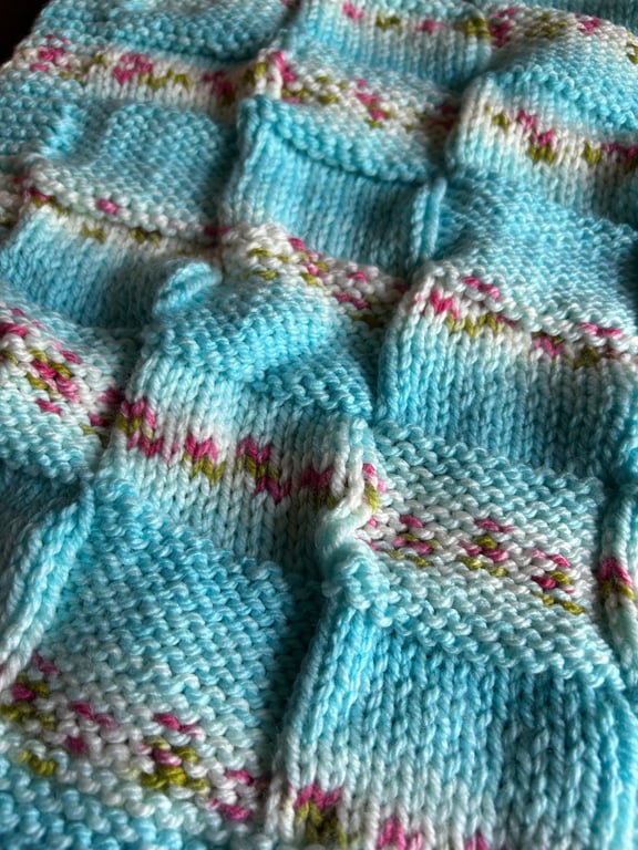 Beautiful handknitted baby blanket in Hayfield Baby Blossom Chunky wool