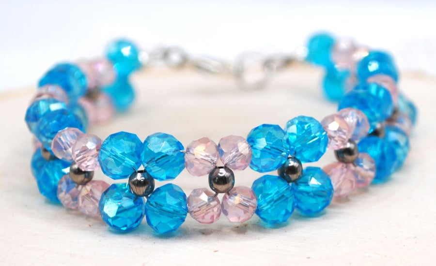 Turquoise and Pink Facetted Glass Bead Bracelet. Free UK Postage