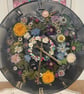 Large floral wall clock, dried flower arrangement.