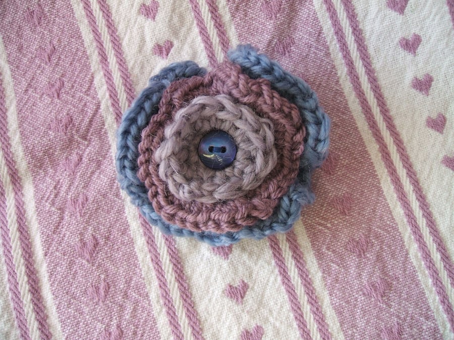 Small crocheted flower brooch - purple and blue