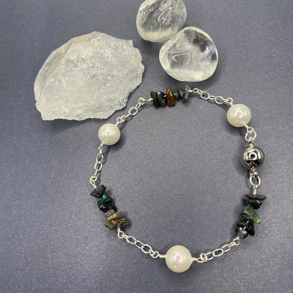 Silver plated chain bracelet with black Ethiopian opal nuggets and shell pearls